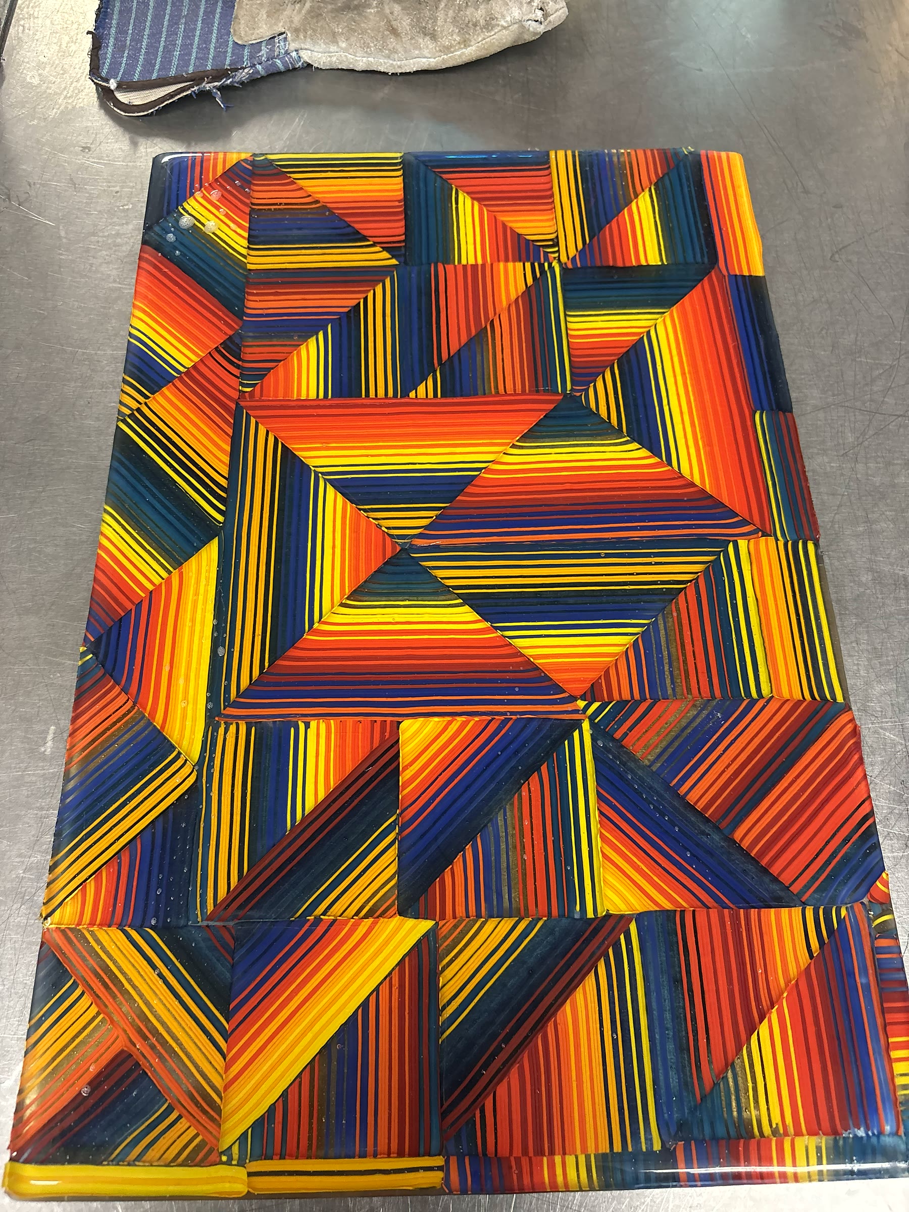 Colorful patterned glass wall artwork