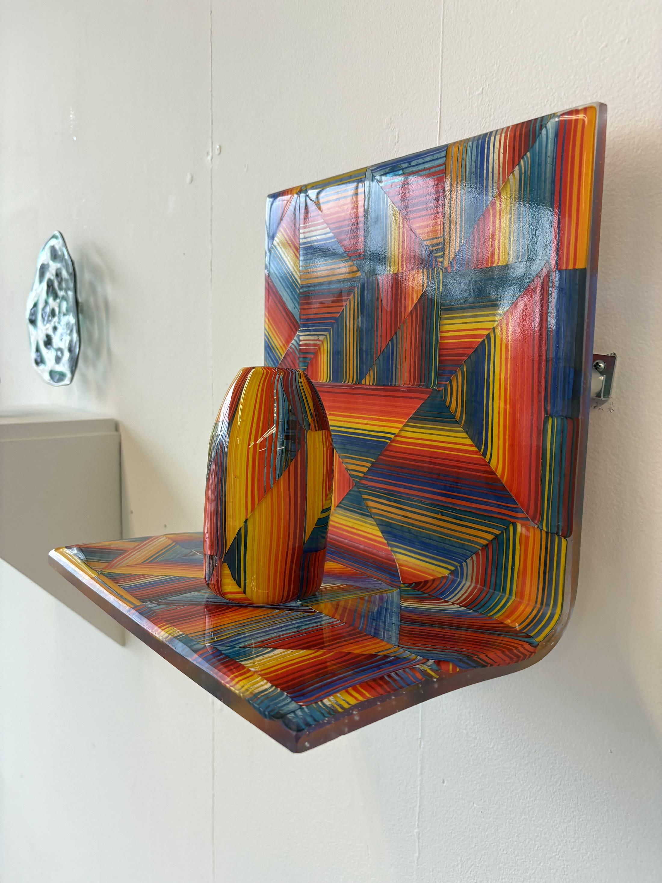 Colorful glass and metal wall artwork